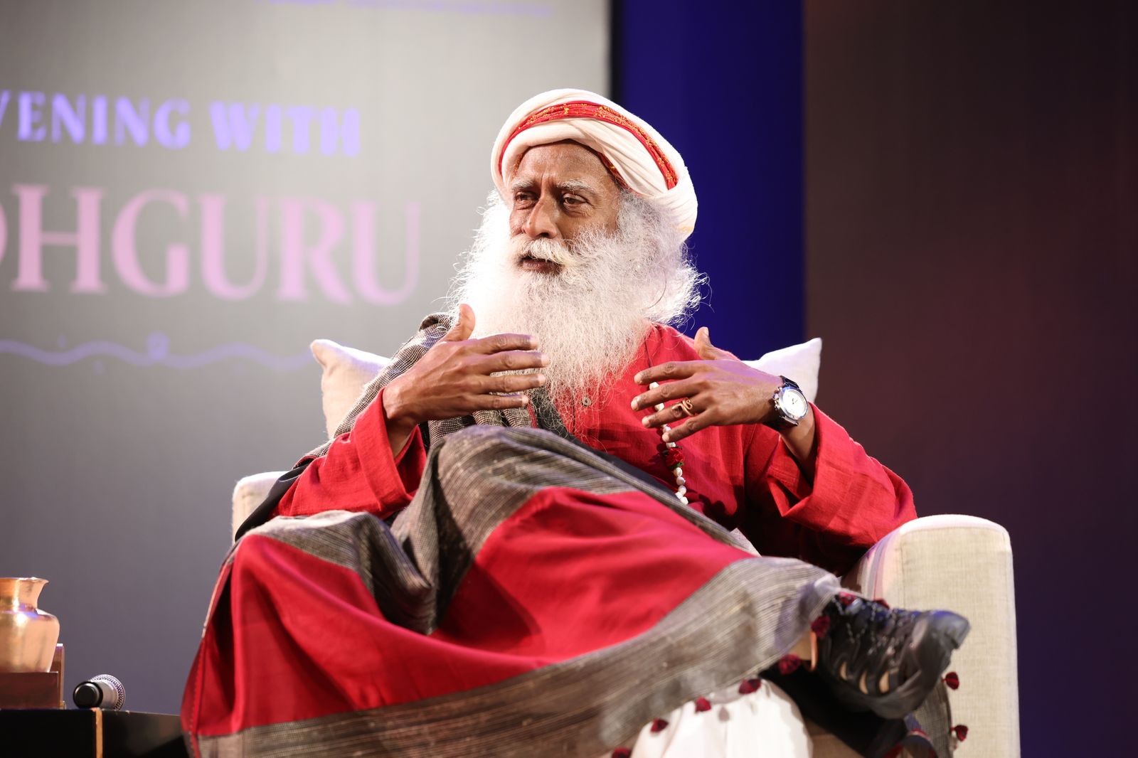 Sadhguru speaking on stage